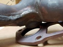 Passenger-side (right) exhaust manifold weld failure, close-up 2. 