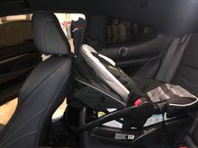 Rear facing carseat with the same leg room for the front passenger as the front facing carseats. 