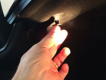 Remove clips from top side of trunk so it can flex.  You aren't removing this piece.