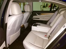 The rear seating is relatively spacious as long as you are not too long legged. The controls inserted into the armrest are a little goofy, but they work and are just cool. Don't let your kids go crazy back there.
