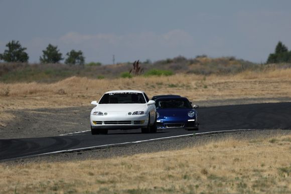 Being hunted by a magnificent Aqua Blue 997.2 GT3 RS!  The gentleman driving it is the organizer, and went by me like I threw an anchor out of my car of course.