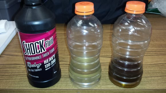 maxima shock fluid(left) oil vs stock bc racing shock fluid(right) oil
