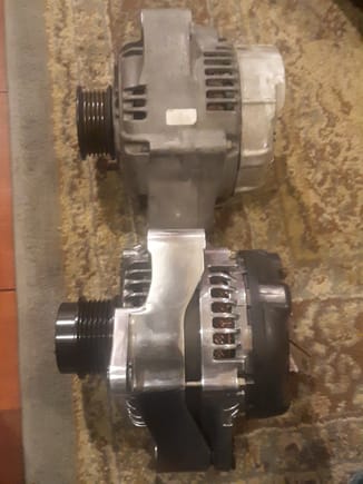 Side view of LS400 and LS430 alternator.
LS430 alternator front and rear housings clamp onto laminations, instead of each other...
The front shell may shift without the third ear mounting bolt for stabilization.