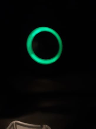 This is the illuminating ring at night to help locate ignition switch.  The camera actually makes it appear brighter than it is....