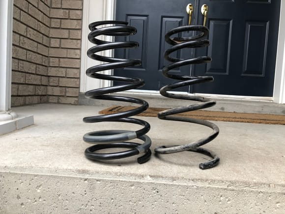 Eibach spring on the left, OEM rear spring on the right