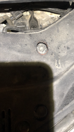 Hole drilled to make battery clamp removal easy