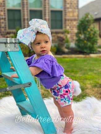 Recent photo from a modeling shoot she did for my sister in law's baby boutique.

Be still, my beating heart.