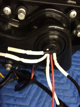 I cut wire insert it in the pre-drill hole on grommet. I used head to seal to secure everything after reconnect wire