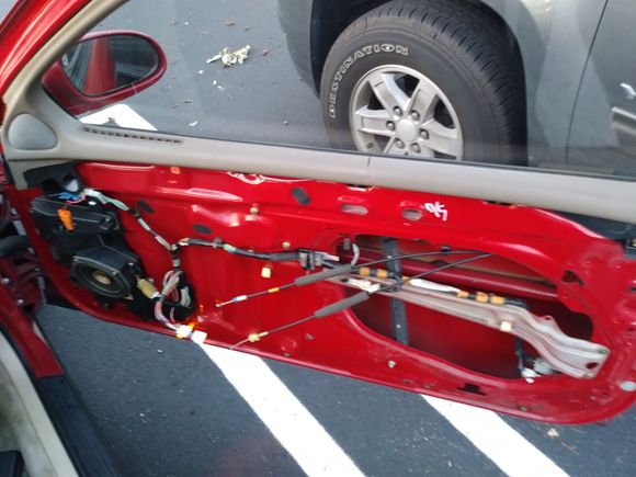 And passenger window regulator and motor.
