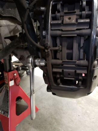 Front Caliper Pad Retainer bolt removal