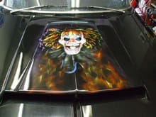 Pissed off clown, I had this painted on the scoop to give the car some character. Look close at the eyes and the lapel.