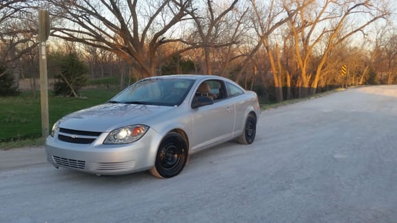 Still looking like a regular old Cobalt with missing hub caps.  I hate hub caps or anything fake, like fake hood scoops.