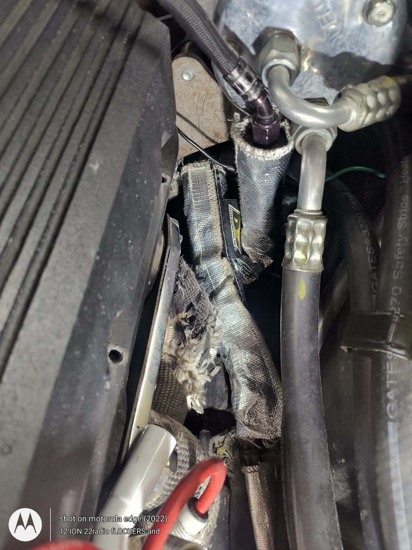 Heat shield sleeves on fuel lines 