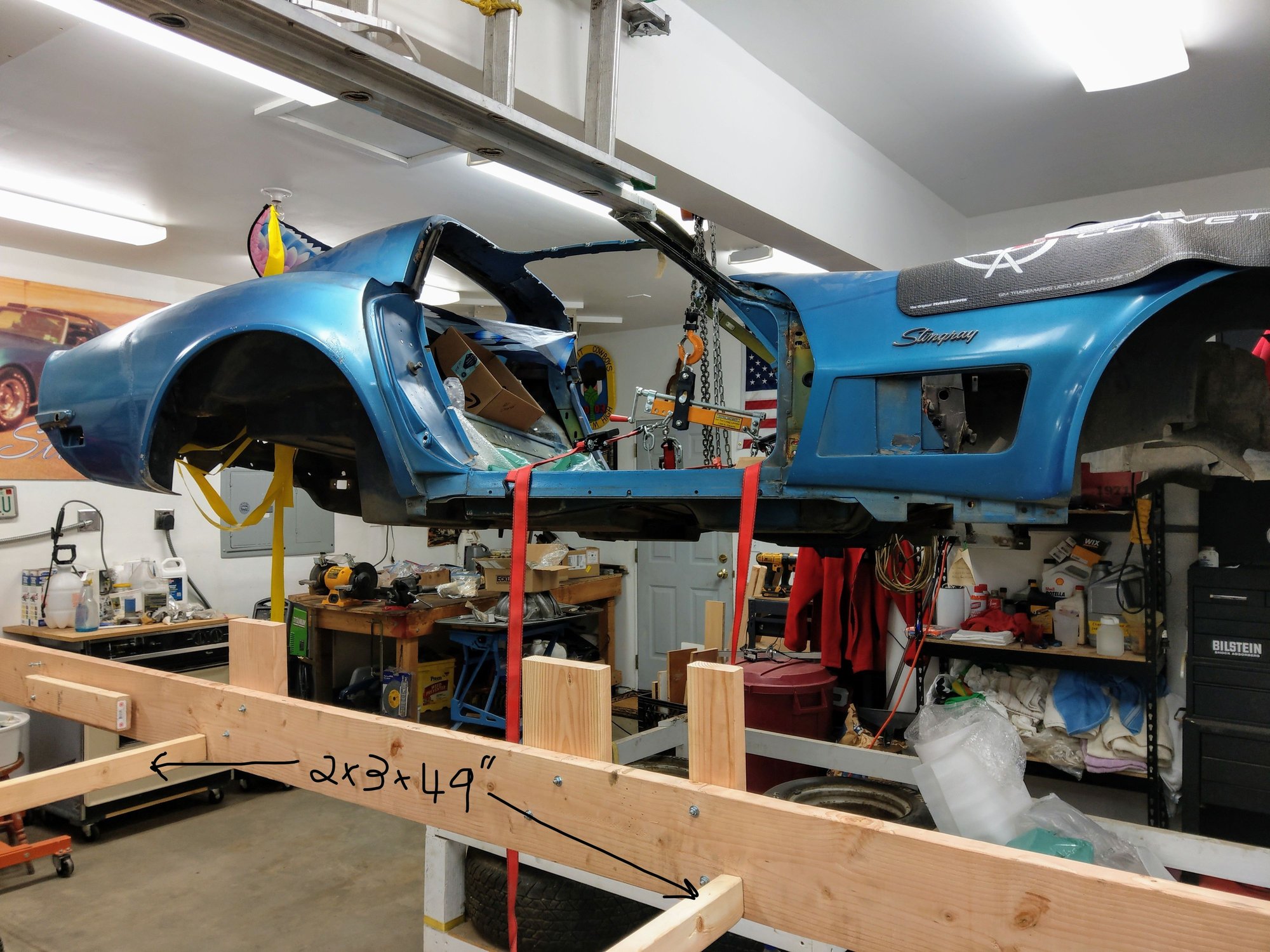 Bracing to help rigidity.  Note uprights can be rotated out of the way one at a time to work on the body mounts themselves.