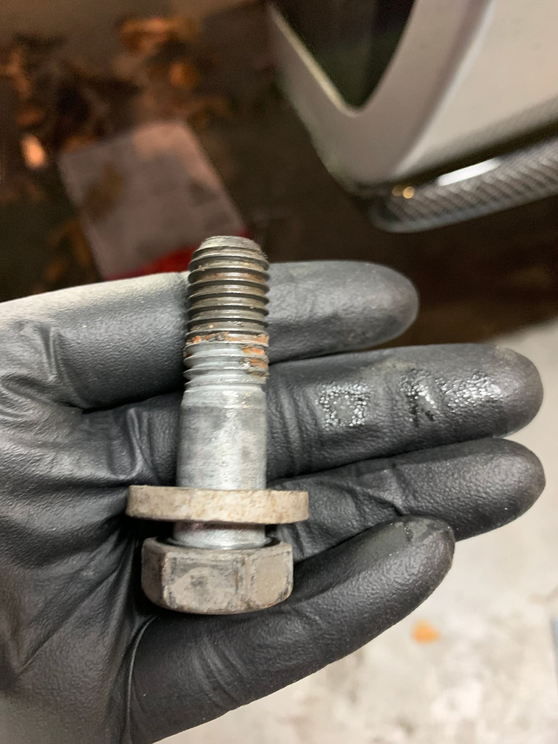 Trans replaced then rear caliper fell off identify this bolt? Page