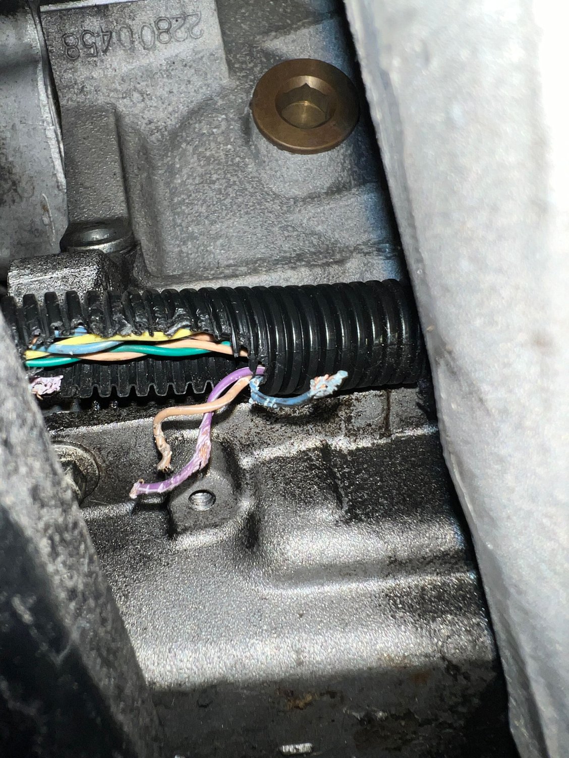 wires between spring and block