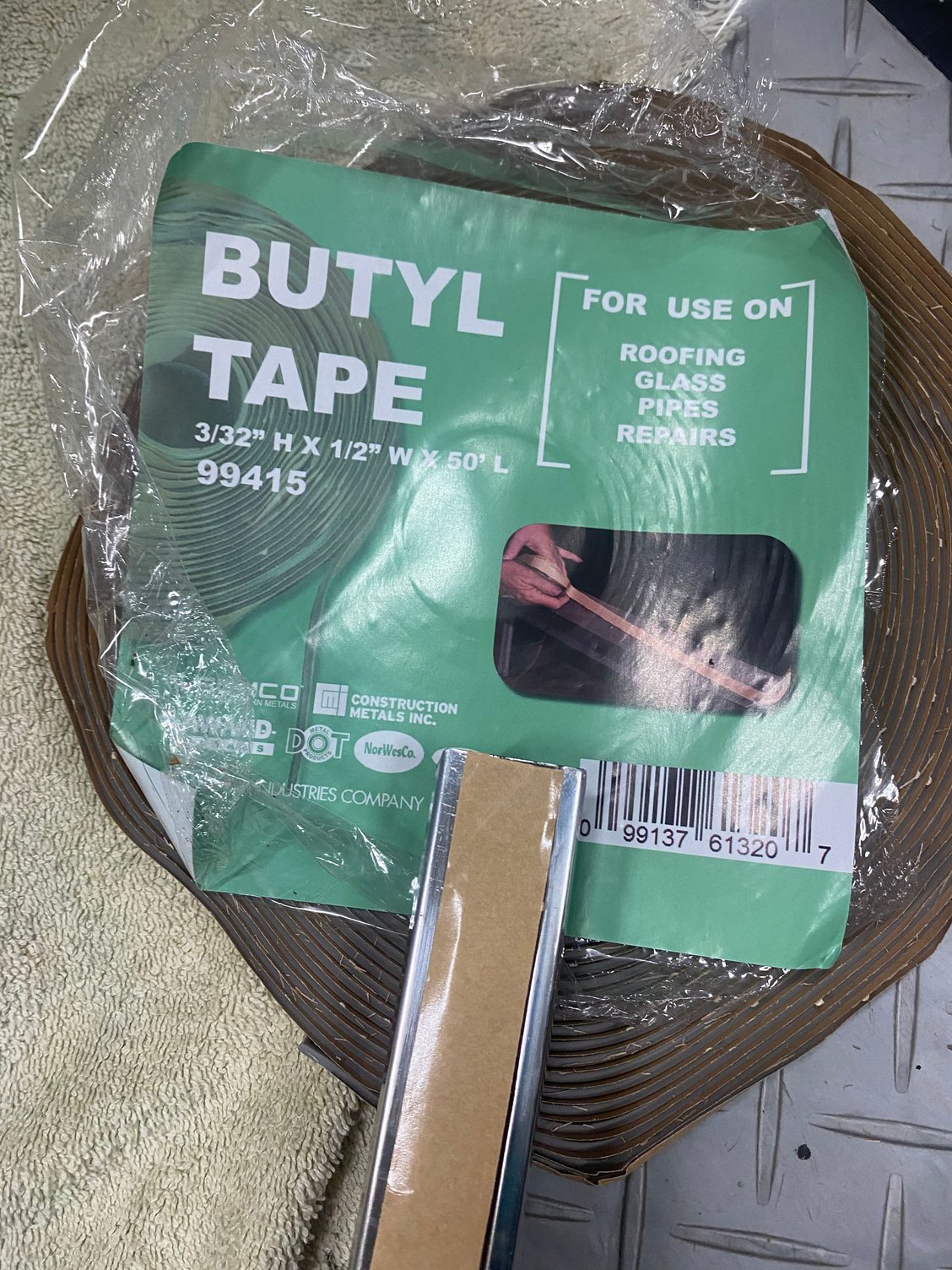 Under $7 and fit like a glove into the channel between the retainer and a pillar windshield molding.  