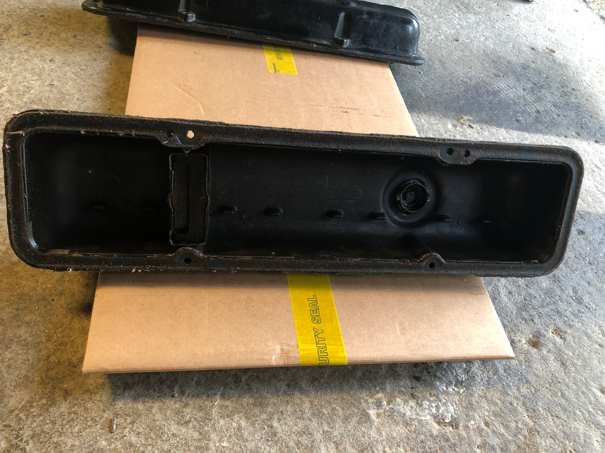 How do i get the aluminum grommet out of the valve covers