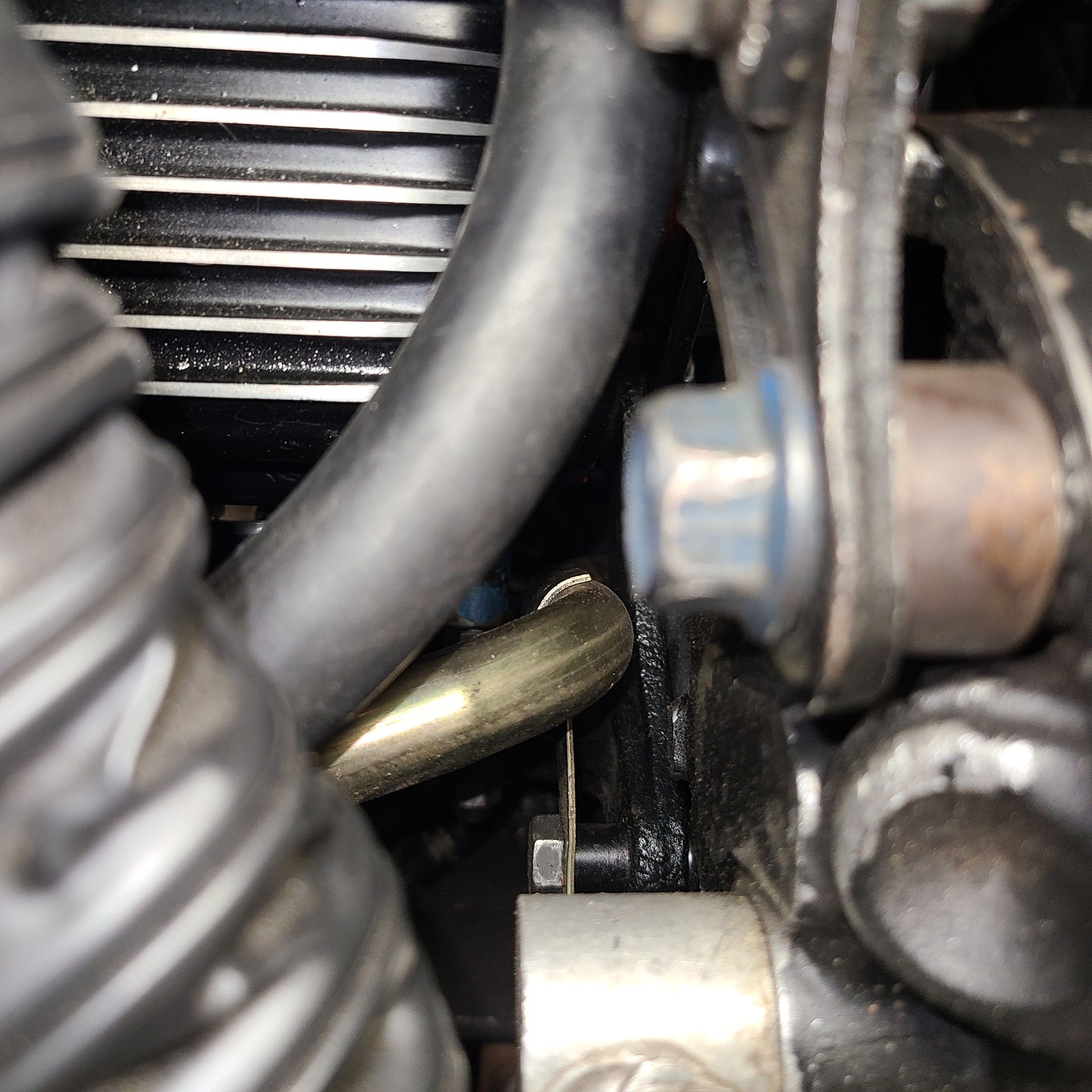 Bolts to back of A/C compressor