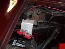 Battery Cut Off on hood latch.
