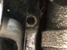 Nut with stud in header