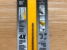 Start with this size, once you have a good hole, use a bigger size to remove the screws head.