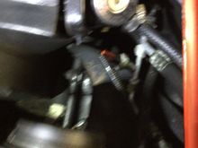 This photo is a little blurry, but the valve and sensor is located near the radiator  and is located in=n the Kline from the condenser.  
