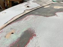 driver side of trunk lid looks flat. back end of car had previous repairs. we are hoping we can make adjustments. thinking of slicing below then re-fiberglass 