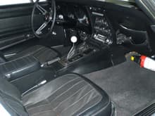 Stock interior - only give-away is the hurst 5-shifter...