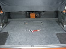 Trunk mod, houses a 10 in JL sub and 1000 Watt Amp