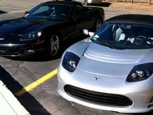 2006 z51 Vette and 2011 Tesla.