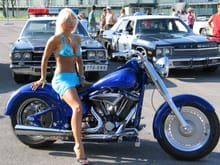 Here she is again...all the guys watched carefully as she mounted this Harley!!!
