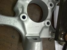 The Brembos use this mounting bracket to the C4 spindle as shown here.