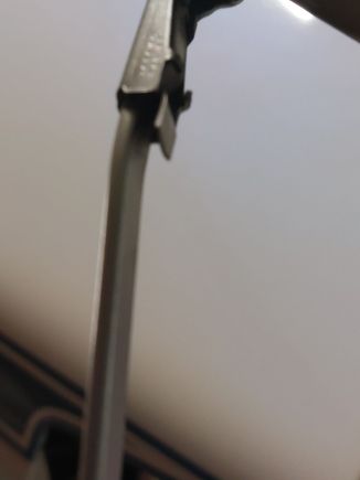 To remove the complete wiper blade assembly, it is spring loaded to hold a small knob on the arm to the assembly. Flex the assembly enough to disengage the knob and pull.