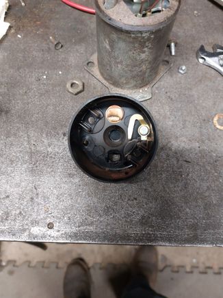 Inside of the cap R terminal on the right but on the left when installed on the solenoid.