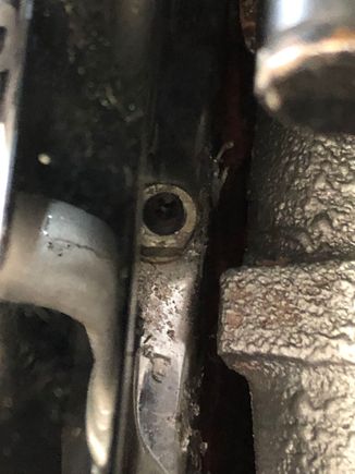 Nut with stud in header
