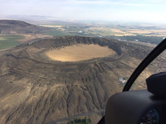 here is a picture approaching those two volcanoes from the south at a heading of about 010. In the helis we typically do not go over monida pass. usually its clearer to the east a bit up through bigsky valley. 

just cool to see right inside the volcanic crater!!
