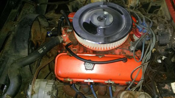 Rusty NOM but 454 & runs. Original 049 heads but 73 Vette manifold & carb, 78 block.