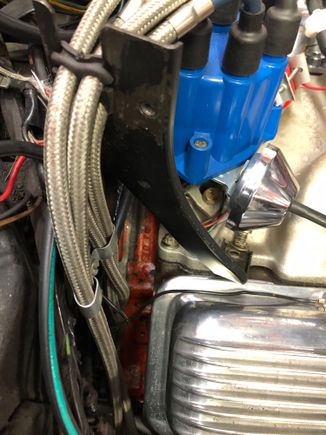 Passenger bracket is second bolt from firewall on Edelbrock Manifold 
