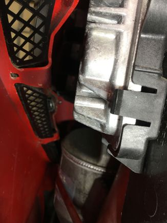 I was able to remove the two nuts that I saw (not easy to get to, but I did it), but even with those two off, the vent didn't want to move.  My inspection mirror revealed a third, lower-most nut that still needed to come off.  Not gonna happen, at least not by me today.  For any of you that have had all three nuts off, confess!  When you put it back together, did you put all three on?  Really?