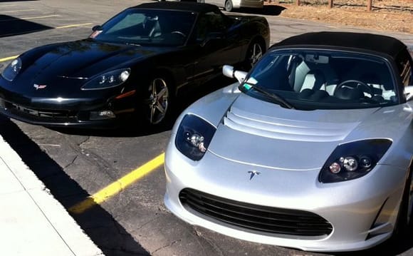 2006 z51 Vette and 2011 Tesla.