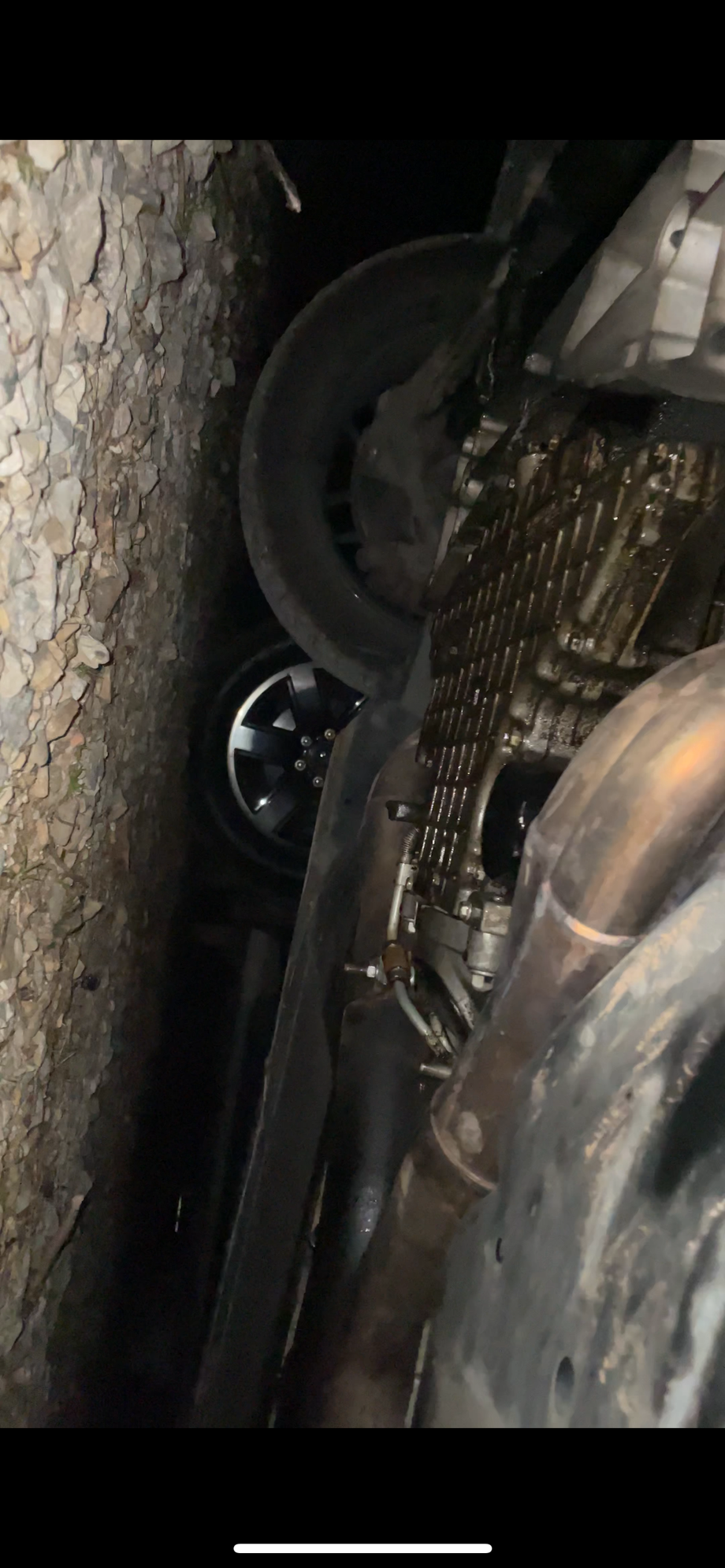 this was from me checking my oil leak so i apologize for the bad pic lol, but the collectors don�t hang down any further than the body, at most a half inch lower