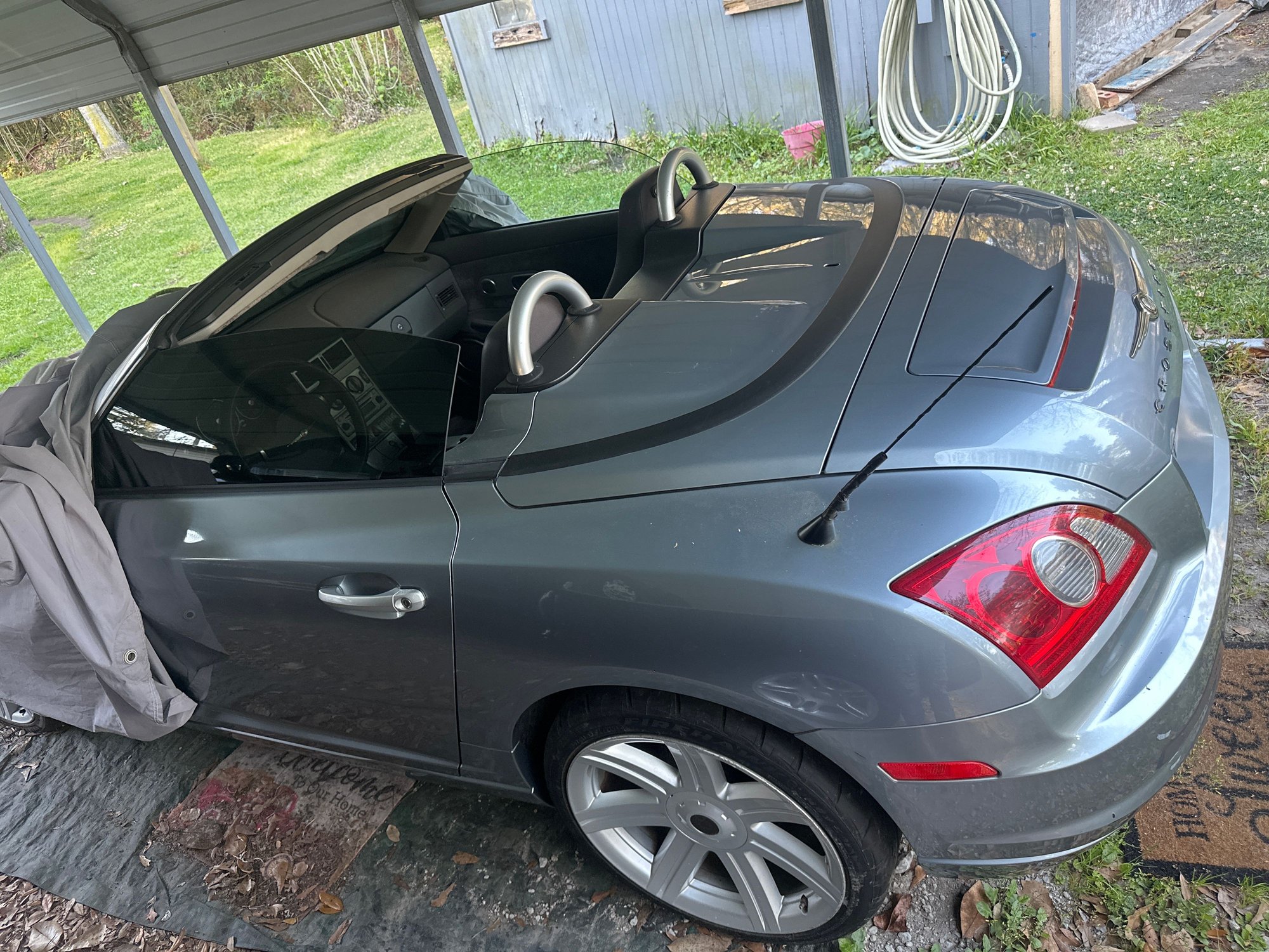 This is the car receiving the top. Don�t talk about the window 🤣 we replaced it and didn�t notice it was for a coupe. It�s about to get replaced also! 