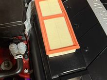 OEM filter on top of the larger air box chamber.  There is a significant difference between the sizes of the filters.  I had already installed the new filters and didn't want to take them out again, but this gives you the idea.