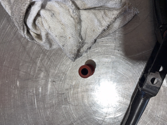 "Bushing" out of the position it is seen in the first photo above.