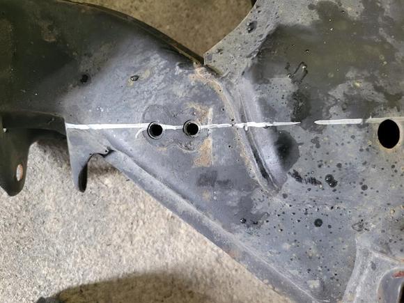 SRT-6 subframe with the bolt holes for the exhaust bracket