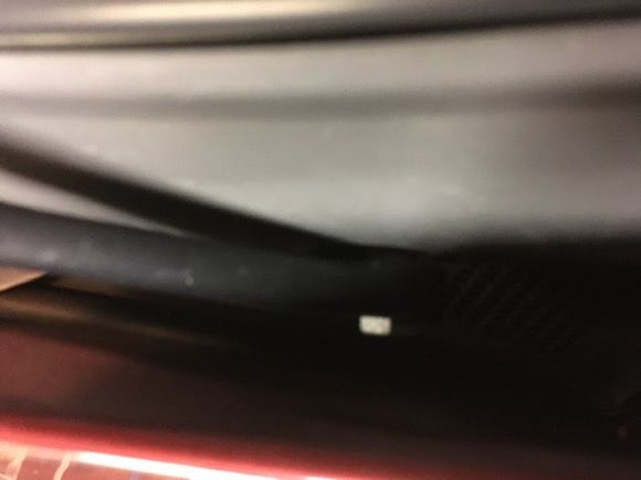 Driver side missing cap.