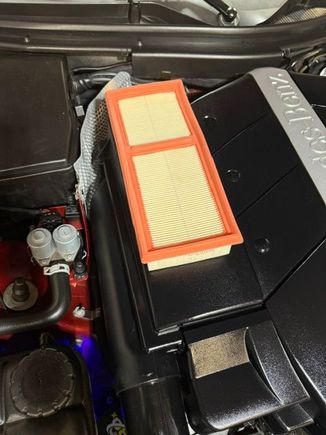 OEM filter on top of the larger air box chamber.  There is a significant difference between the sizes of the filters.  I had already installed the new filters and didn't want to take them out again, but this gives you the idea.