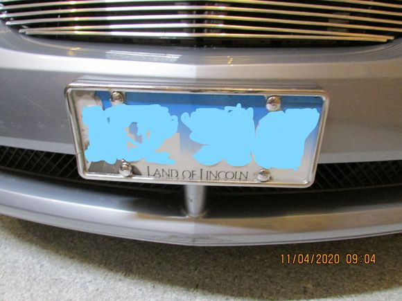 cut down front plate added a chrome frame an chrome covers over the screws
