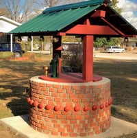 Our old well had a rotten wooden cover. In 2020, we replaced the wooden cover with a wishing well from reused bricks and lumber. The bricks and lumber came from an old house we tore down on our property. The materials if bought new cost about $750, but we only needed to spend about $50 to build this thanks to a gift from a friend and old mortar from a lumber yard.